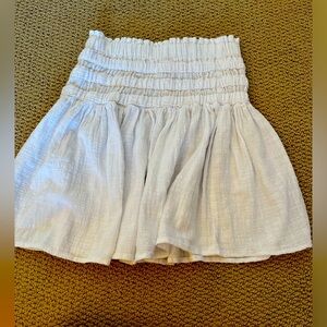 White skirt.